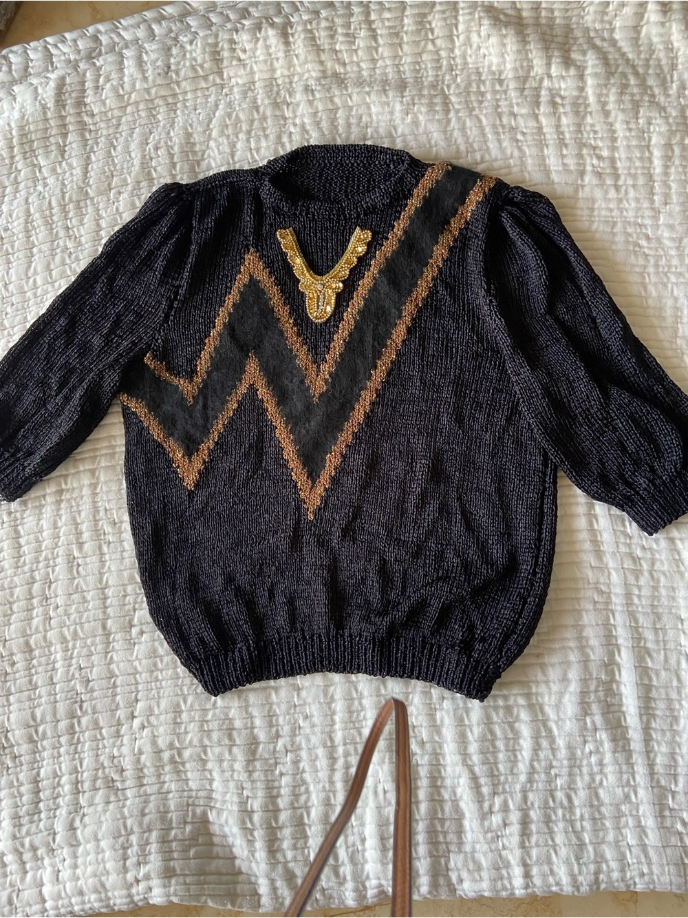 Handknitted in Silk thread sophisticated top , with gold details - one of a kind